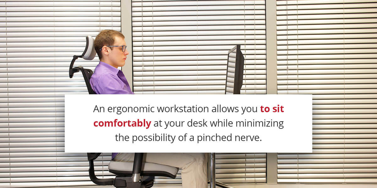 man-sitting-at-an-ergonomic-workstation
