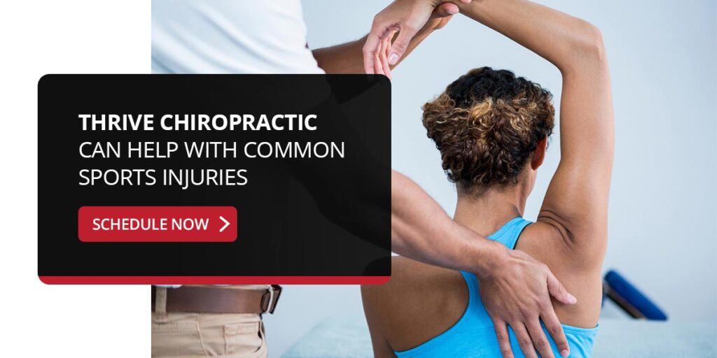 chiropractor aligning person's shoulder